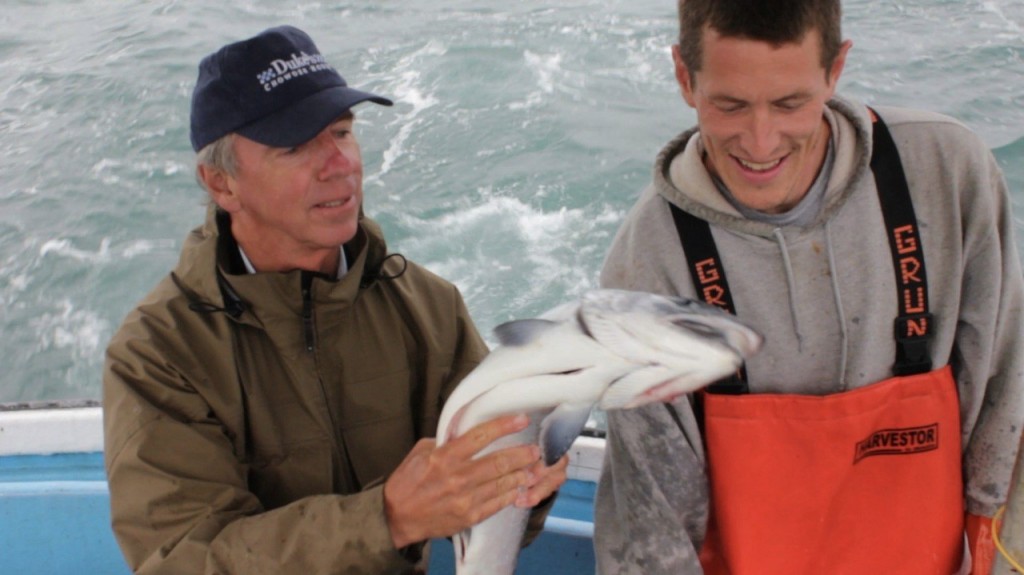 Duke Holding Fish with Jimi