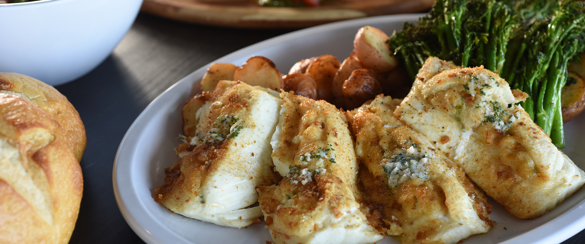 Duke's Halibut Steaks Dinner plate with halibut steaks, asparagus, and potatoes