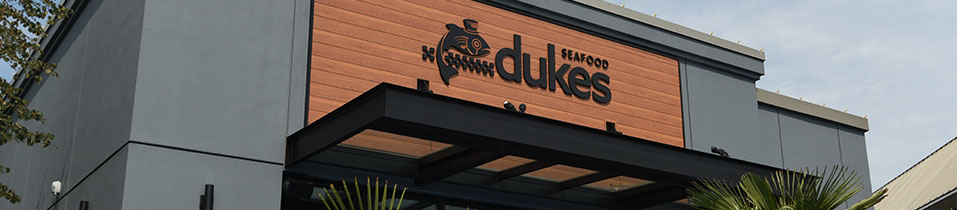 Duke's Seafood logo on Kent Station exterior