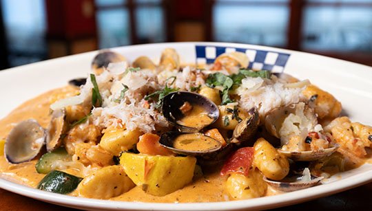Fresh Dungeness Crab, Shrimp & Manila Clam Gnocchi Duke's Seafood Fresh Dungeness Crab, Shrimp & Manila Clam Gnocchi